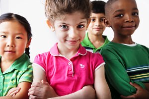 Group of children standing smiling