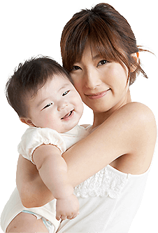 Asian woman holding baby