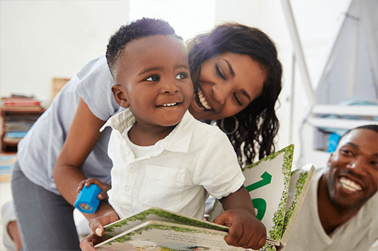 African-American parents teaching child