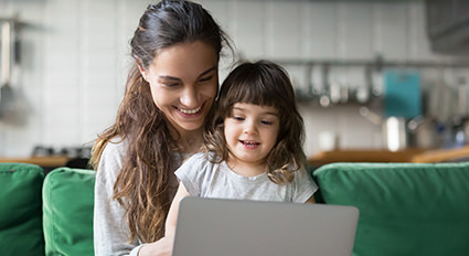 Mother and child on computer